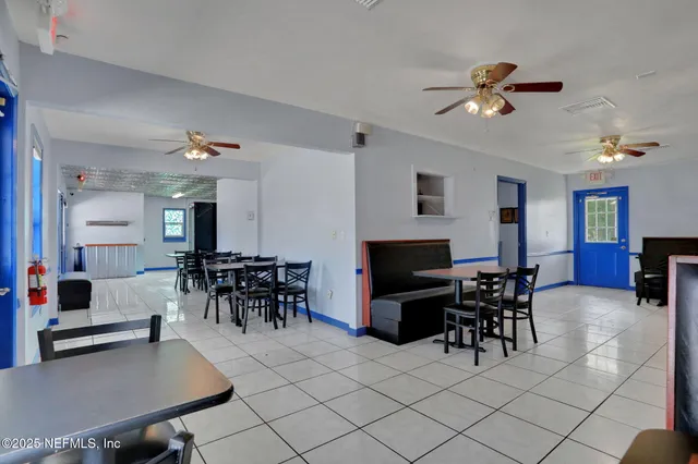a view of a dining room with furniture