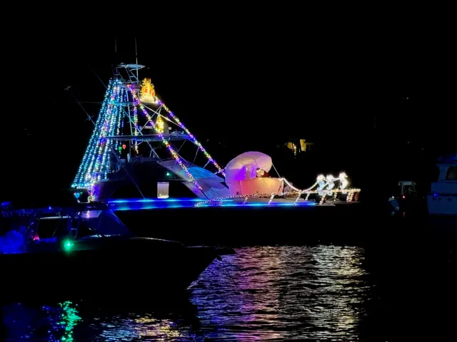a room with lots of flowers and a table