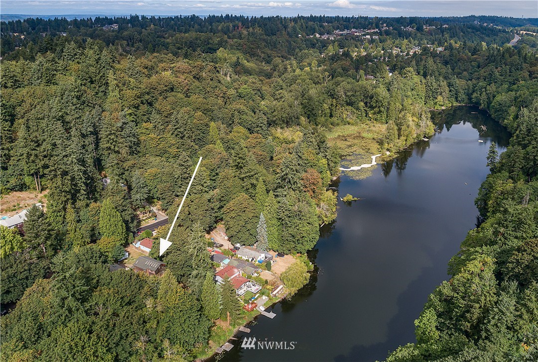 26430 Lake Fenwick Road South Kent, WA 98032 - Photo 22 of 30 a view of a lake with a mountain in the background