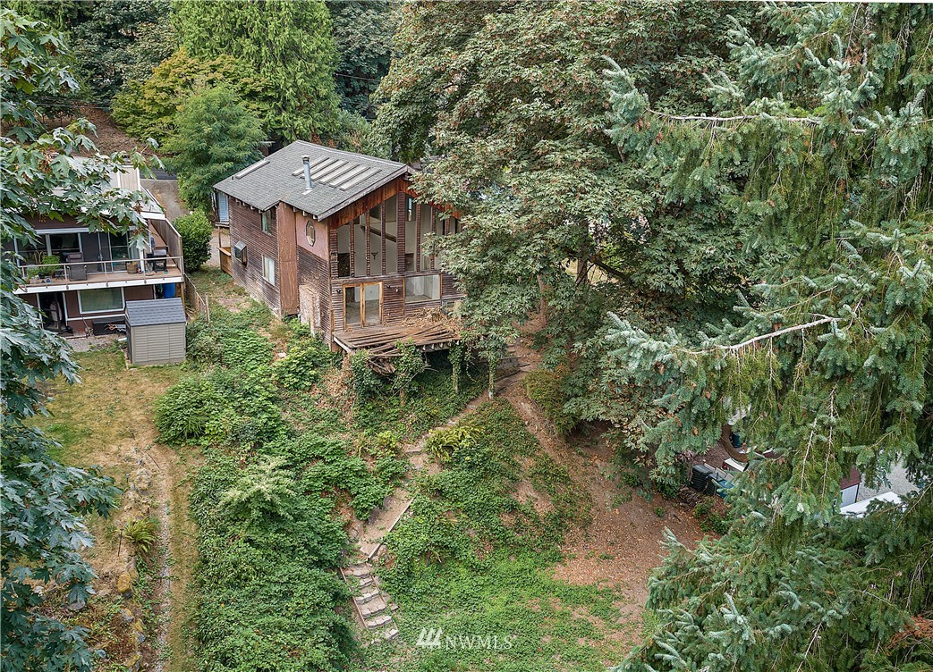 26430 Lake Fenwick Road South Kent, WA 98032 - Photo 23 of 30 an aerial view of a house with yard and trees around