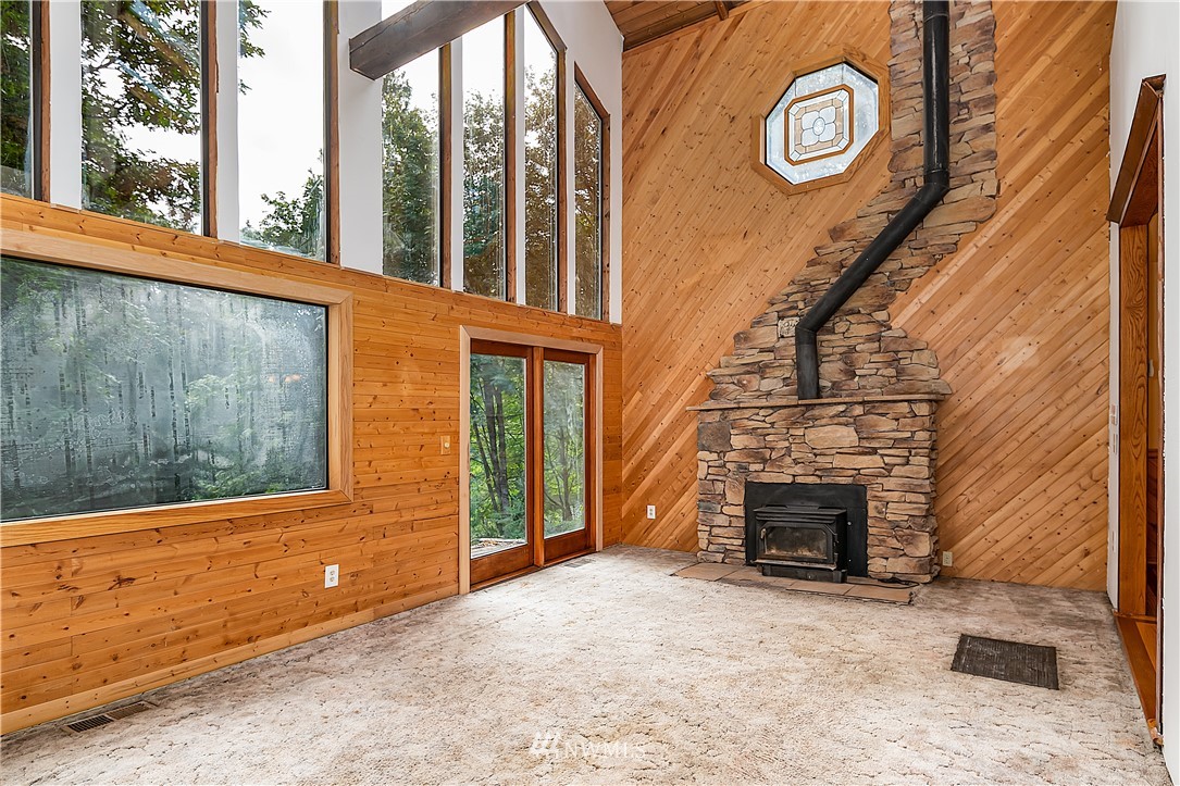 26430 Lake Fenwick Road South Kent, WA 98032 - Photo 4 of 30 a view of a brick house with a large window