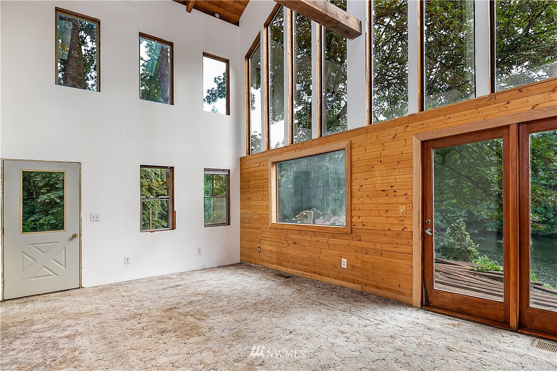 26430 Lake Fenwick Road South Kent, WA 98032 - Photo 6 of 30 a view of a house with a backyard