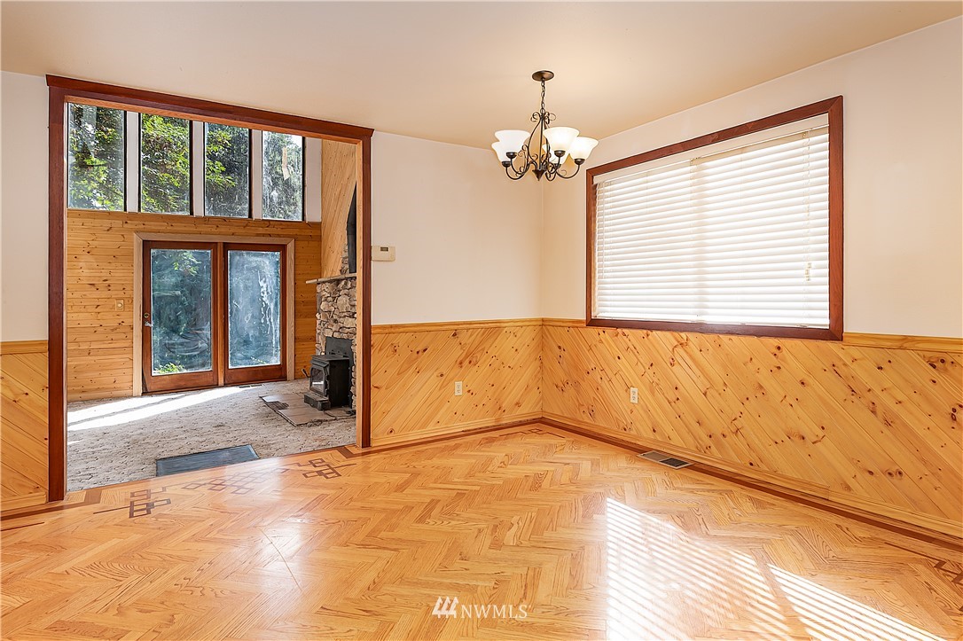 26430 Lake Fenwick Road South Kent, WA 98032 - Photo 9 of 30 a view of an empty room with a window