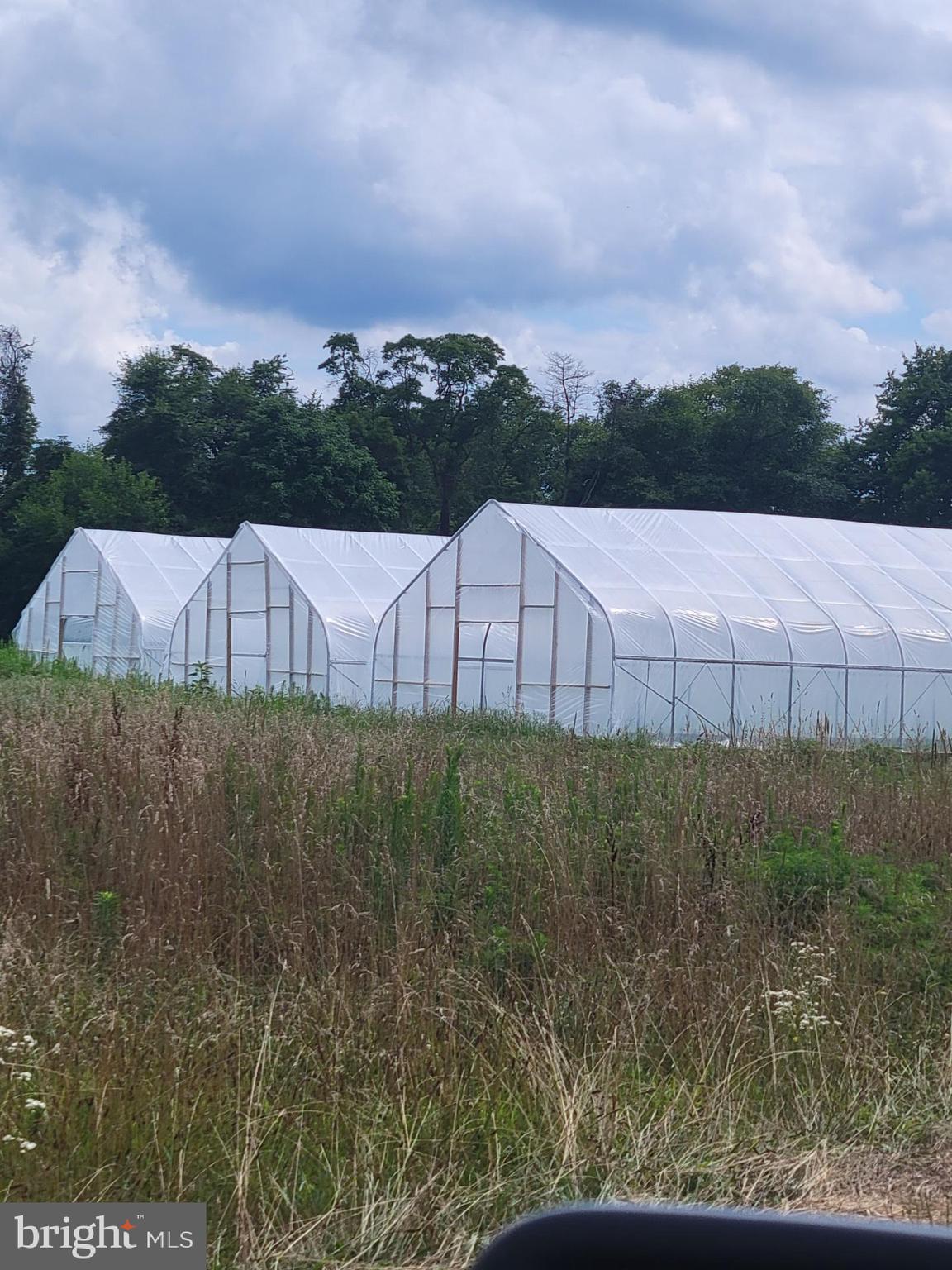 149 Brindletown Road New Egypt, NJ 08533 - Photo 15 of 29 a view of a big yard with a small yard and wooden fence