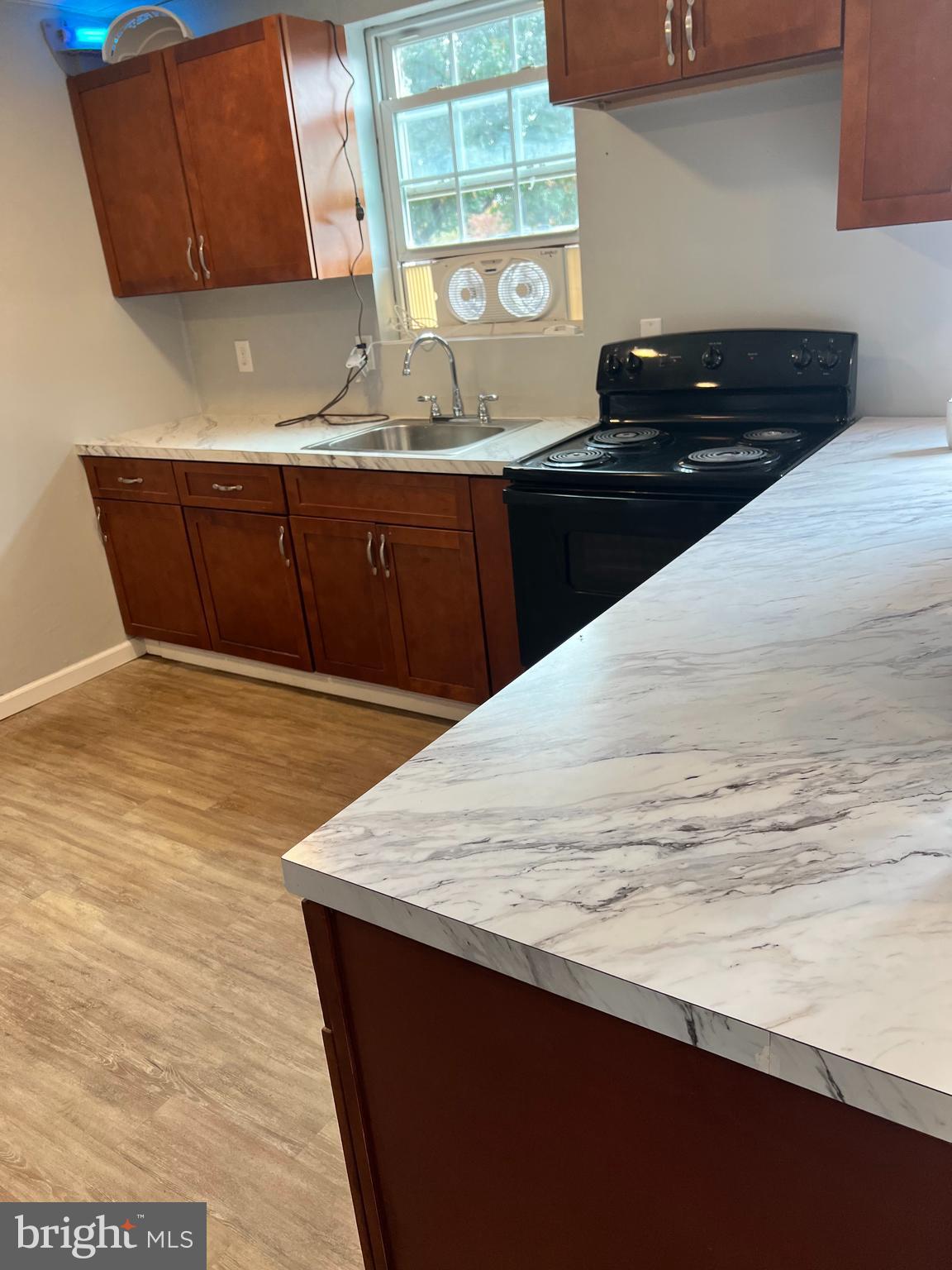 149 Brindletown Road New Egypt, NJ 08533 - Photo 23 of 29 a kitchen with a sink and cabinets