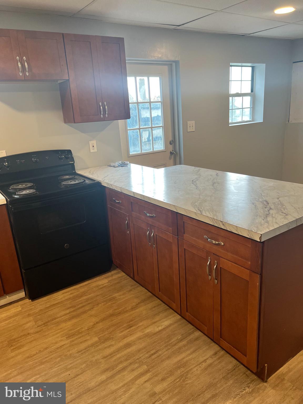 149 Brindletown Road New Egypt, NJ 08533 - Photo 25 of 29 a kitchen with a wooden floor