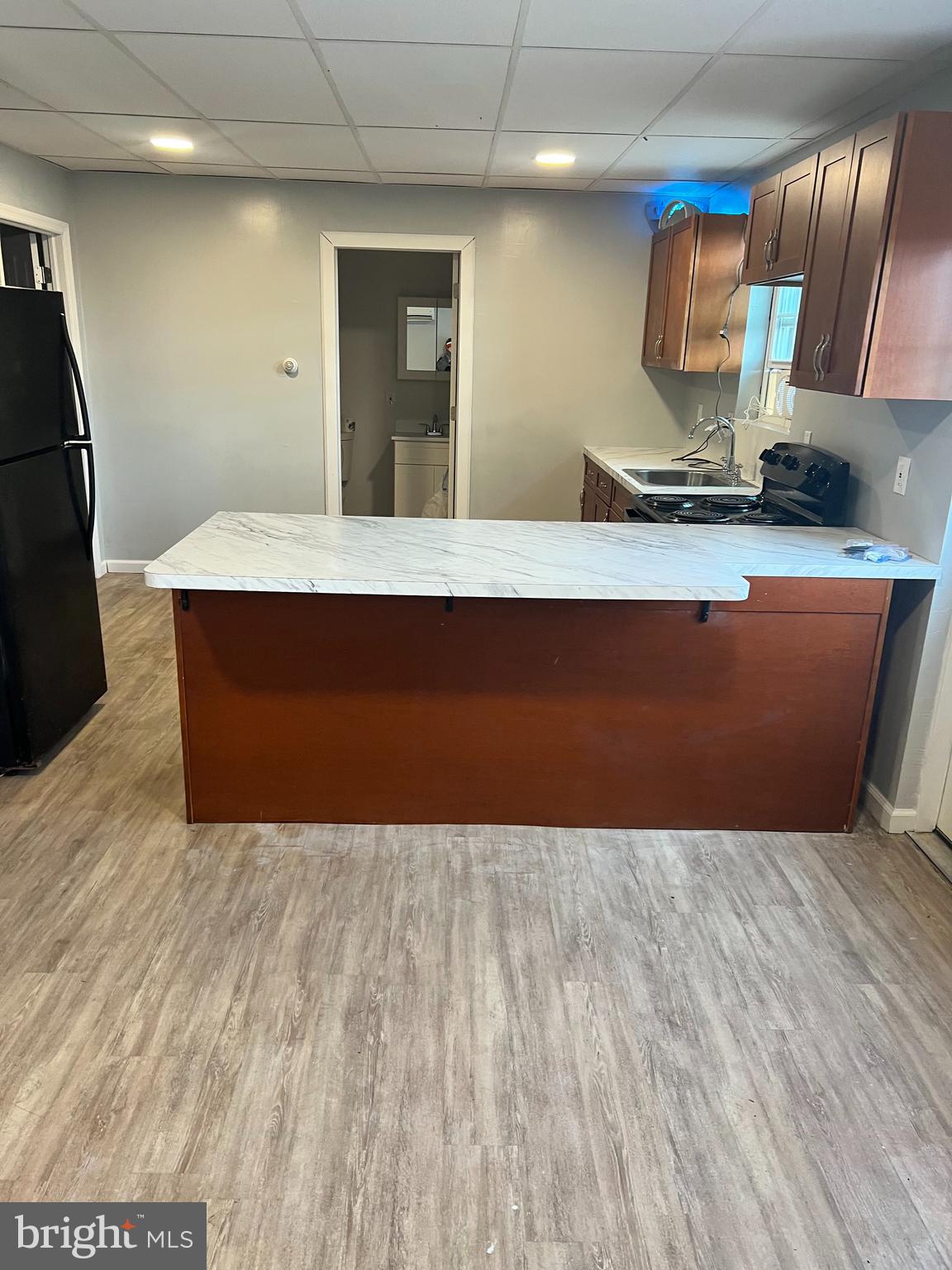 149 Brindletown Road New Egypt, NJ 08533 - Photo 28 of 29 a room with wooden floor and glass door