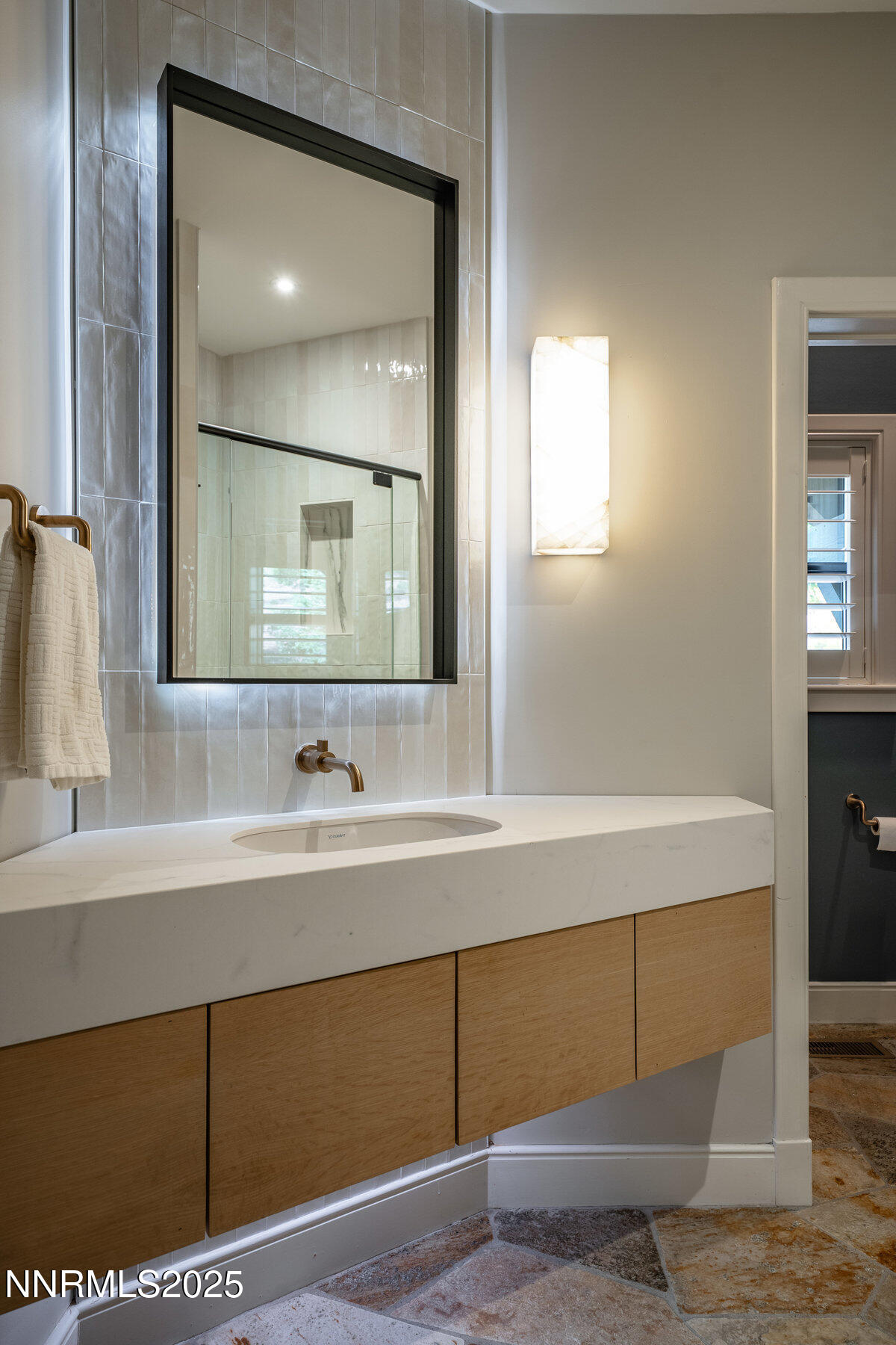 2 South Point Place Glenbrook, NV 89413 - Photo 24 of 49 a bathroom with a sink and a mirror