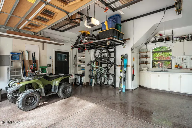 a view of parking garage with cars