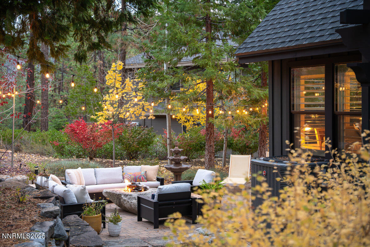 2 South Point Place Glenbrook, NV 89413 - Photo 4 of 49 a patio with table and chairs and potted plants