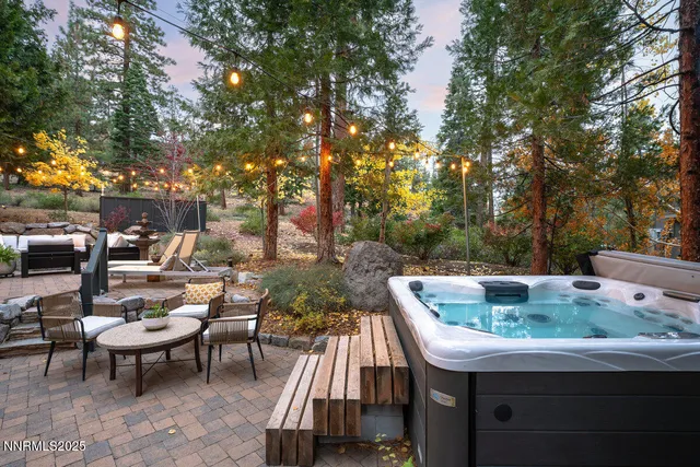 a view of backyard with outdoor seating