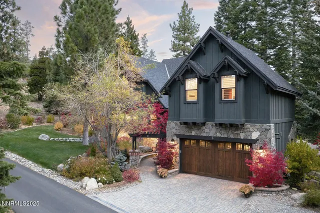a front view of a house with yard