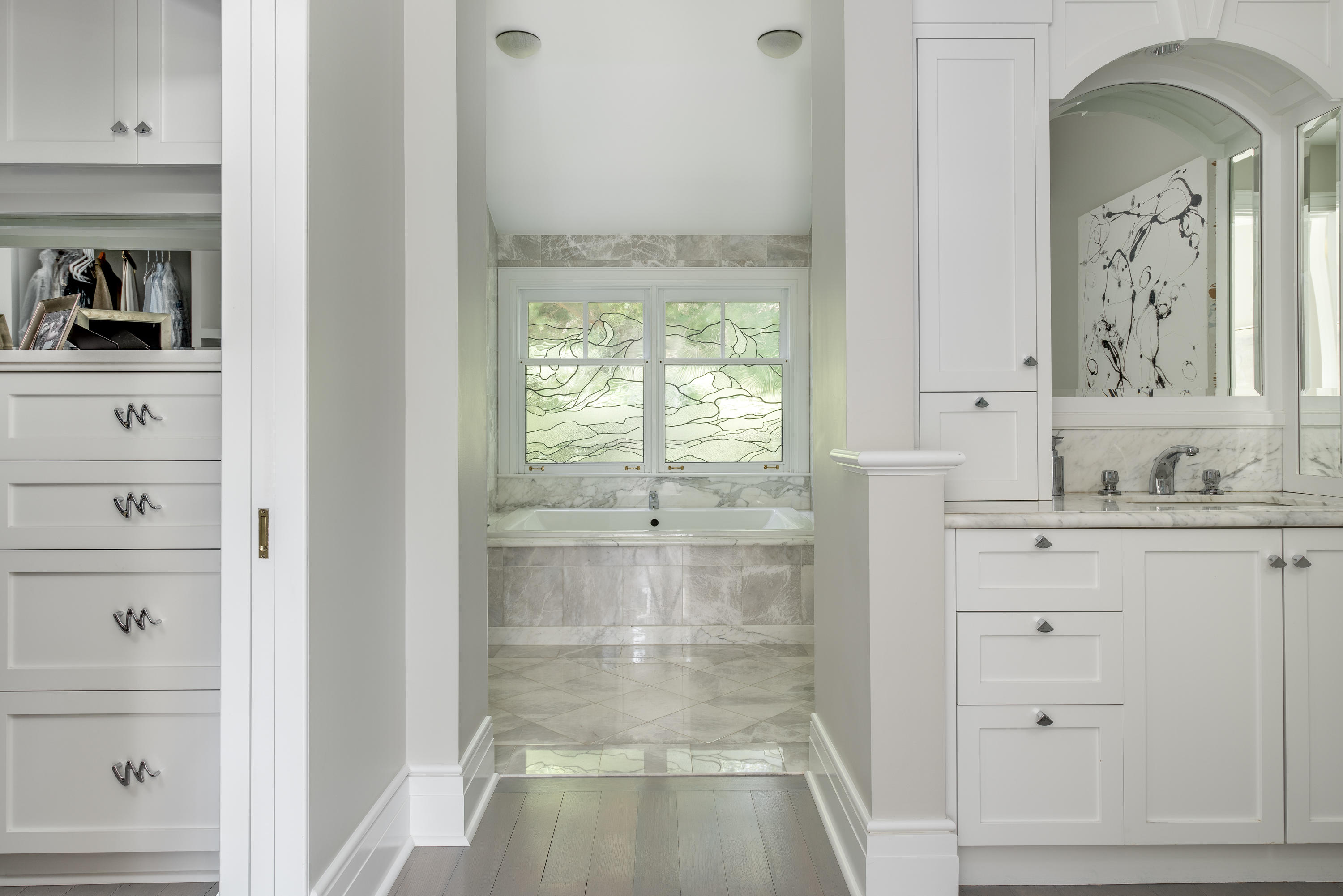 1025 Old Post Road Cotuit, MA 02635 - Photo 12 of 20 a bathroom with a shower sink and mirror
