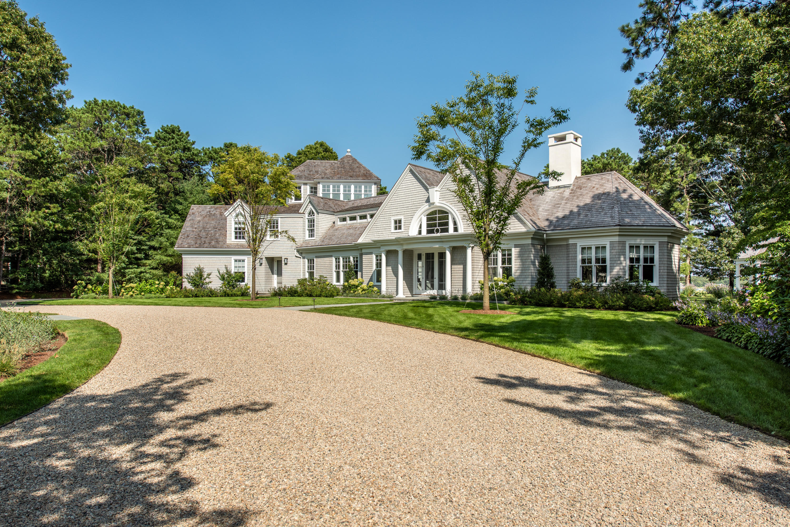 1025 Old Post Road Cotuit, MA 02635 - Photo 19 of 20 a front view of house with yard and green space