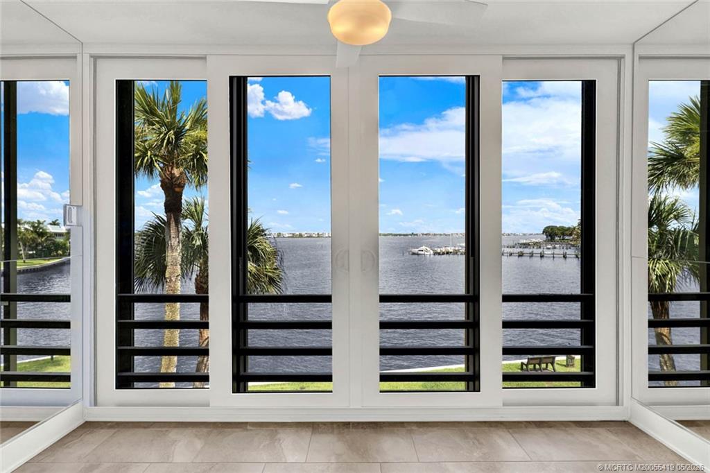 1950 Southwest Palm City Road, Unit 14305 Stuart, FL 34994 - Photo 9 of 70 a view of a balcony with chairs