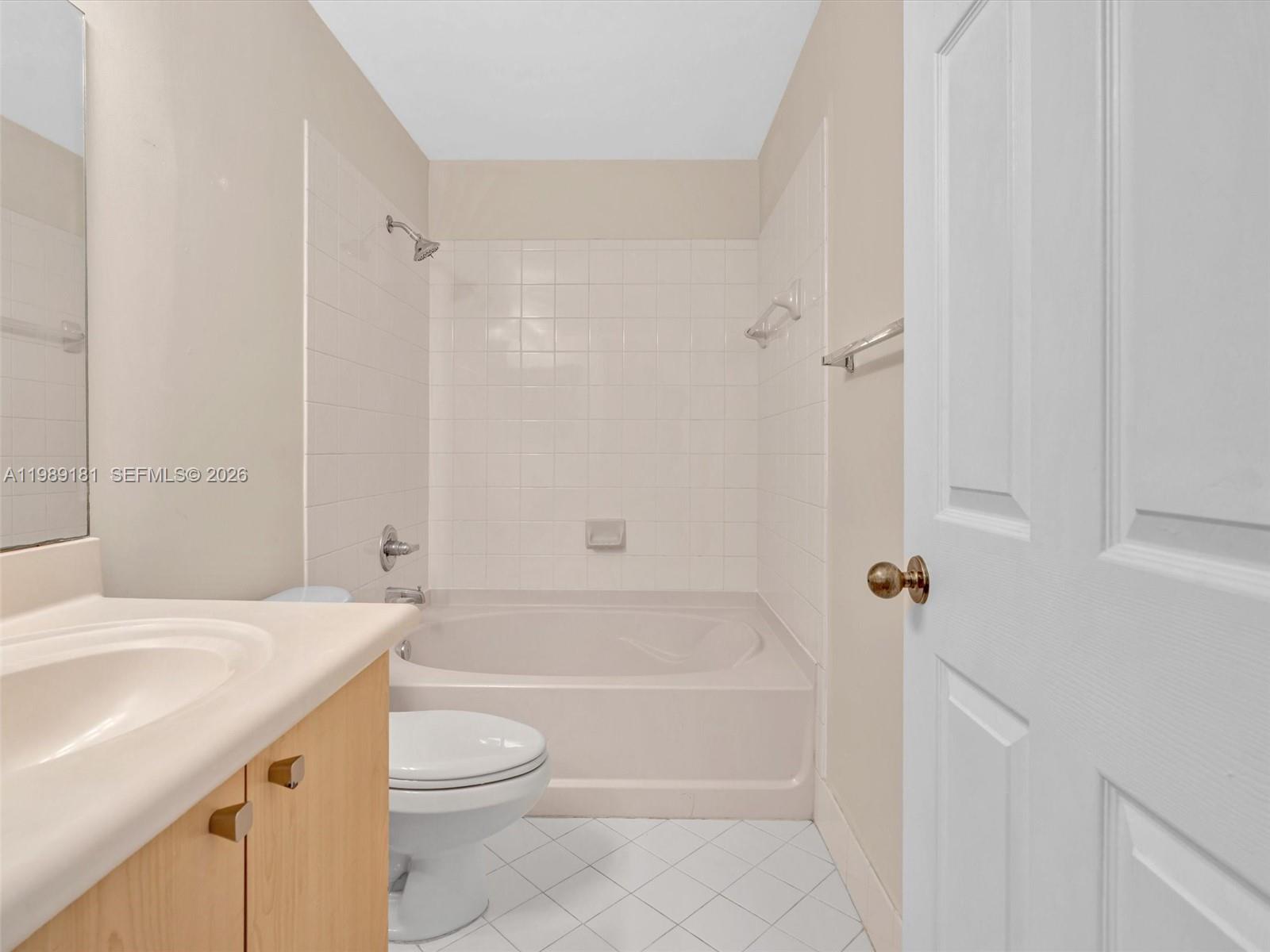 4126 Forest Drive Weston, FL 33332 - Photo 25 of 37 a bathroom with a sink a toilet and shower