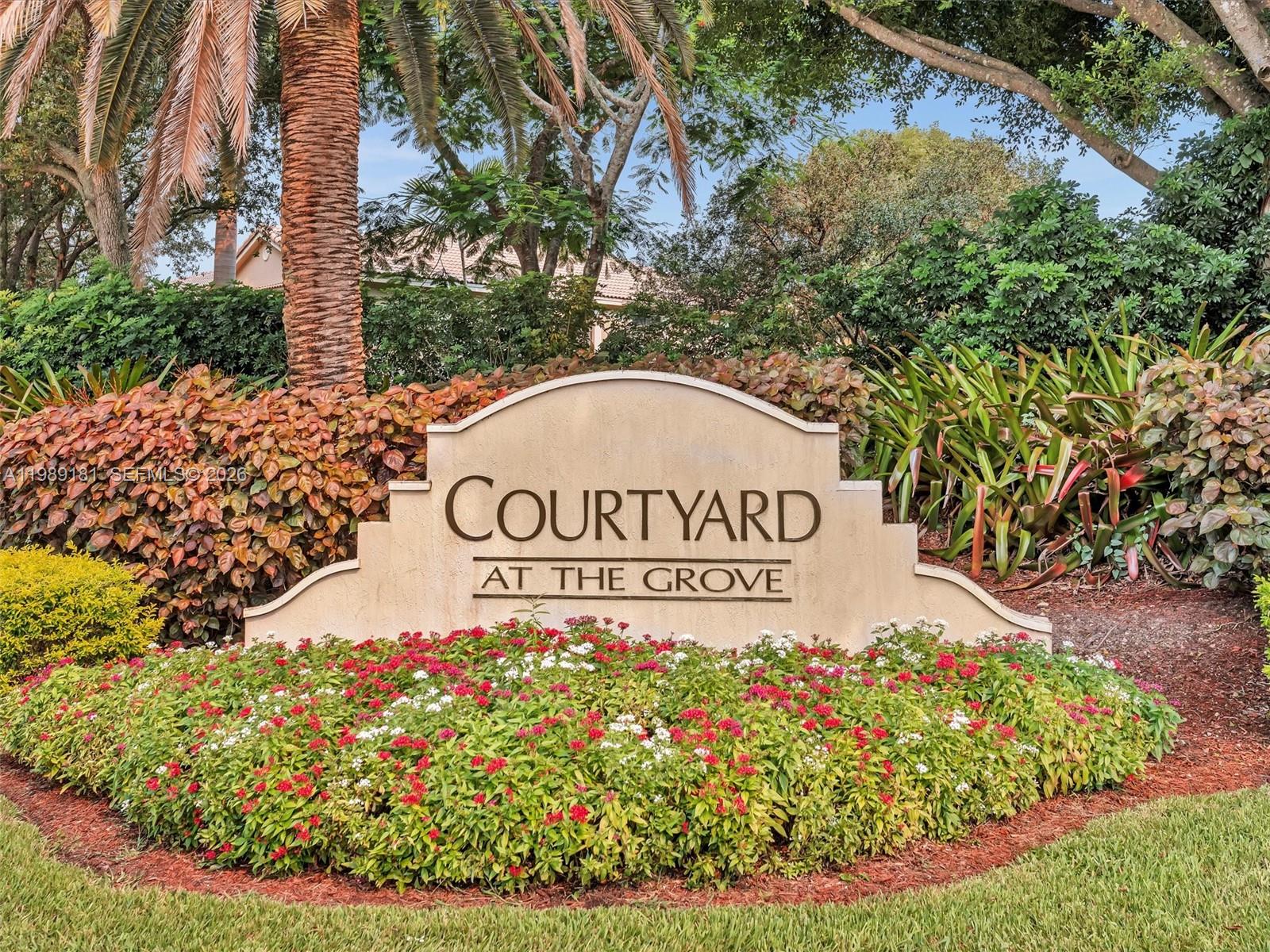 4126 Forest Drive Weston, FL 33332 - Photo 33 of 37 a sign on the side of a road