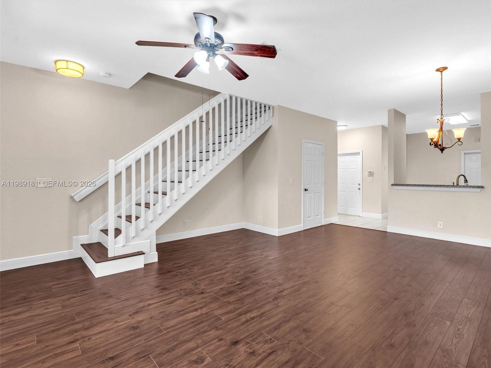 4126 Forest Drive Weston, FL 33332 - Photo 9 of 37 a view of an entryway with wooden floor