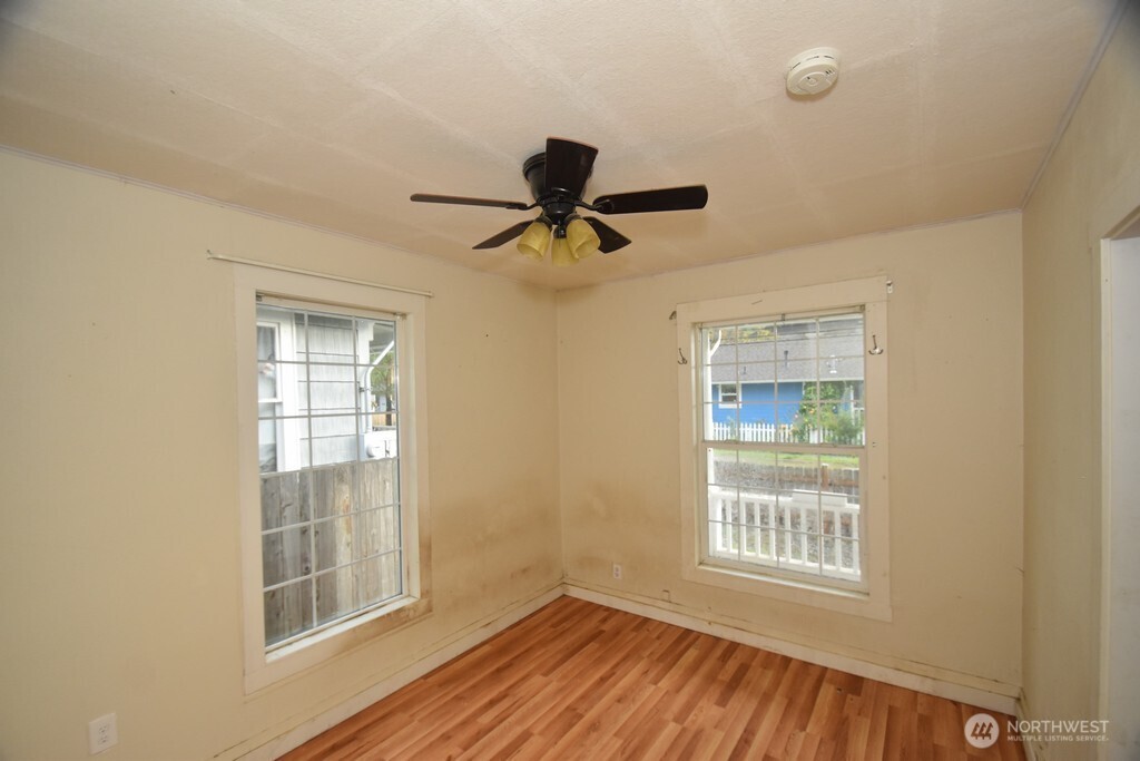 7490 Mill Avenue Concrete, WA 98237 - Photo 13 of 35 a view of an empty room with a window