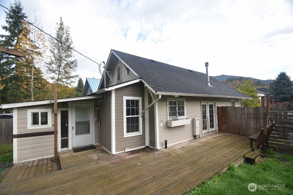 7490 Mill Avenue Concrete, WA 98237 - Photo 27 of 35 a front view of a house with a yard