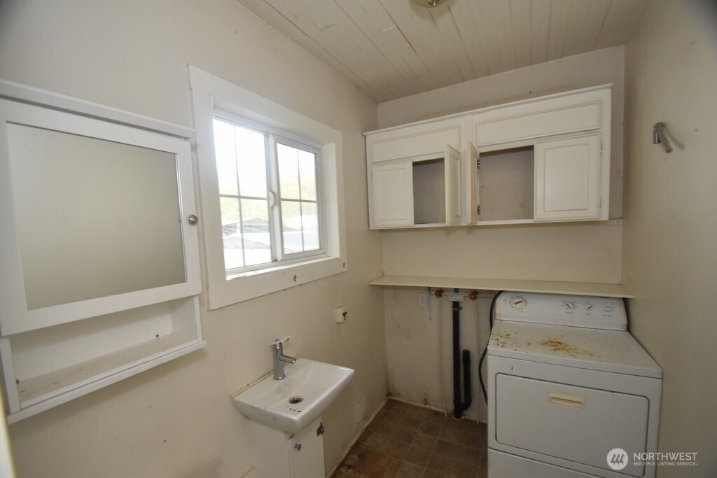 7490 Mill Avenue Concrete, WA 98237 - Photo 34 of 35 a utility room with dryer and washer
