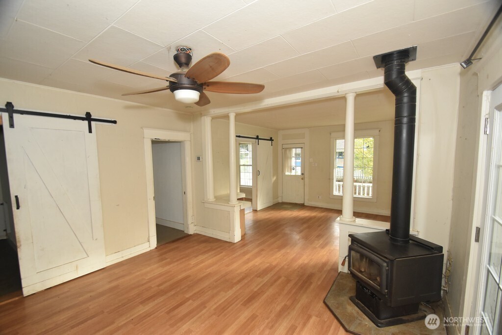 7490 Mill Avenue Concrete, WA 98237 - Photo 6 of 35 a view of an empty room and wooden floor