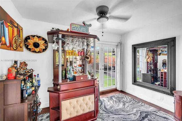 an aerial view of a house with swimming pool garden view and a lake view