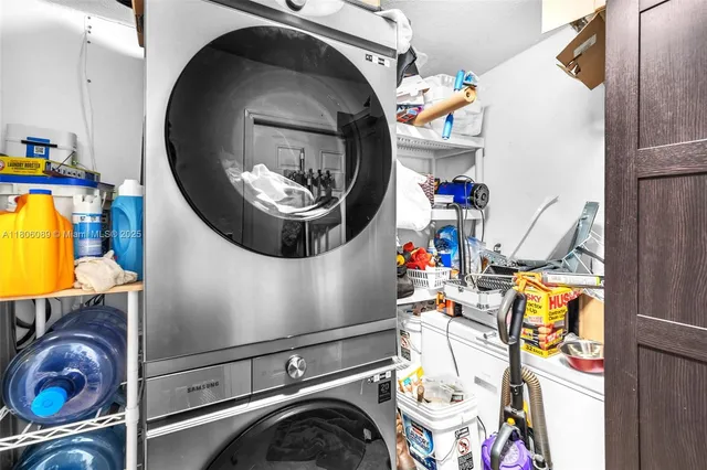 a patio with wooden floor a yard a table and chairs