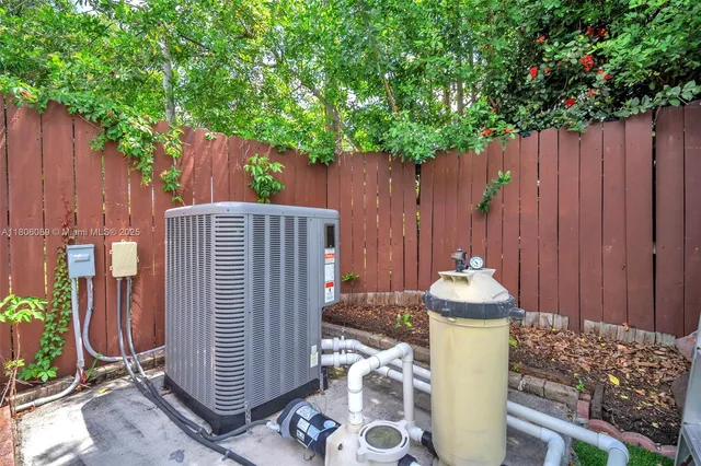 a view of a house with backyard and a garden