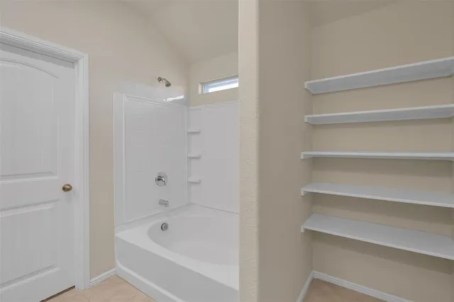 a bathroom with a bathtub