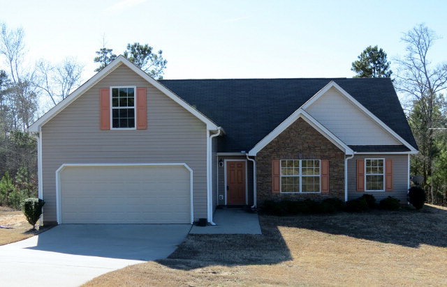 3390 Trotters Ridge Trail Gray, GA 31032 - Photo 1 of 13 a view of a house with a yard