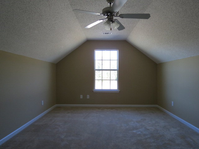 3390 Trotters Ridge Trail Gray, GA 31032 - Photo 12 of 13 an empty room with a window