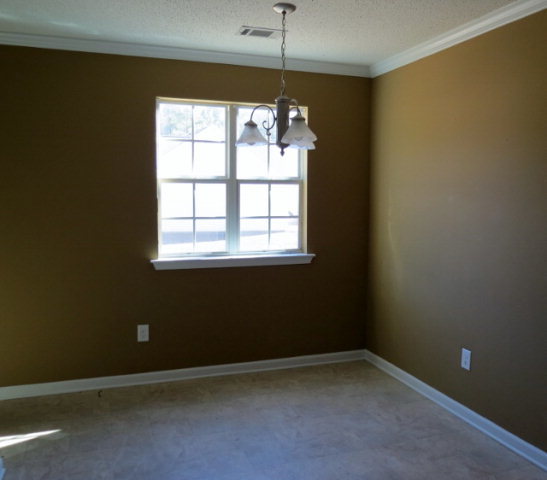 3390 Trotters Ridge Trail Gray, GA 31032 - Photo 7 of 13 a room that has a window in it