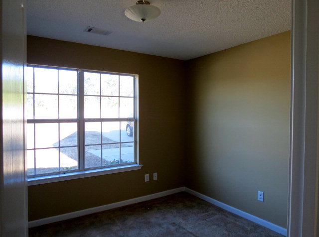3390 Trotters Ridge Trail Gray, GA 31032 - Photo 10 of 13 an empty room with a window