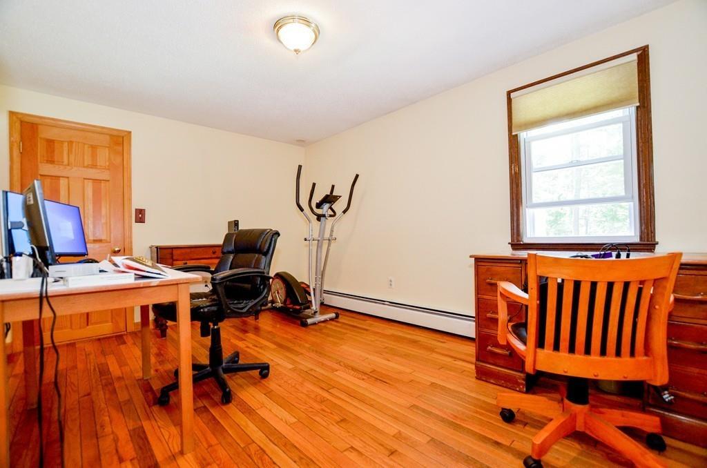 899 Walnut Plain Road Rochester, MA 02770 - Photo 29 of 42 a view of a workspace with furniture and a window