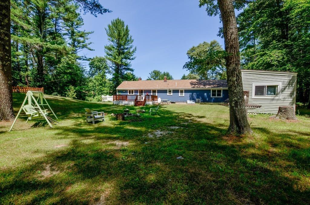 899 Walnut Plain Road Rochester, MA 02770 - Photo 5 of 42 a view of a house with a yard