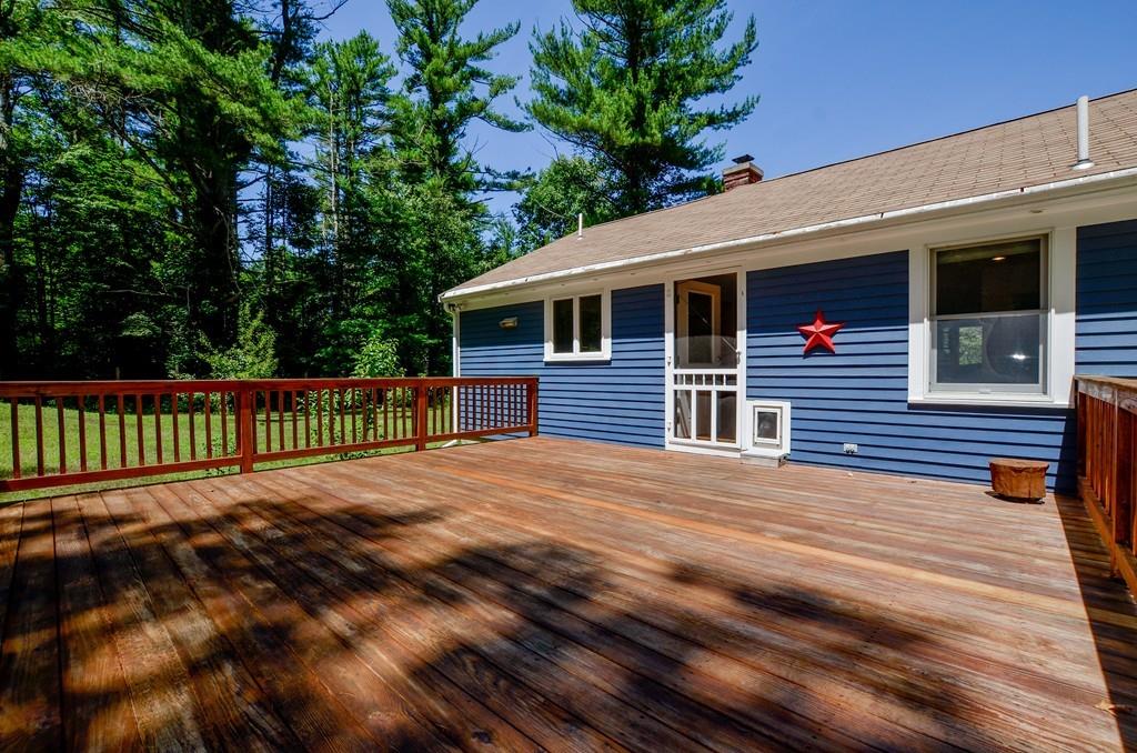 899 Walnut Plain Road Rochester, MA 02770 - Photo 8 of 42 a view of a house with a patio