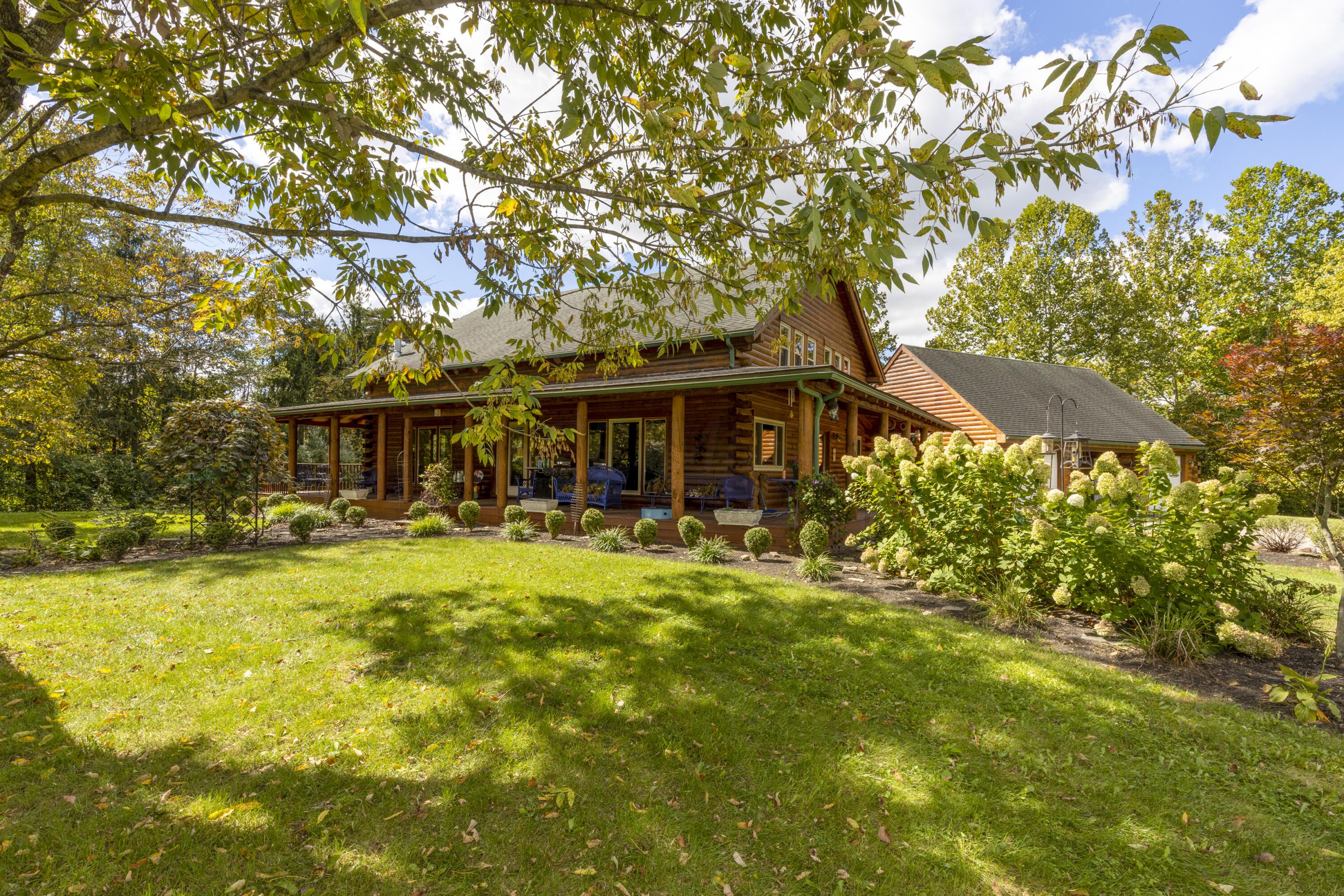 13275 Pickerington Road Northwest Pickerington, OH 43147 - Photo 1 of 76 TRUE LOG HOME COULD BE Airbnb. SO MUCH OPPORTUNITY TO EXPAND LIVING SPACE.