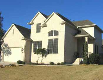 10535 Chestnut Ridge Road Austin, TX 78726 - Photo 1 of 1 a front view of a house with a yard