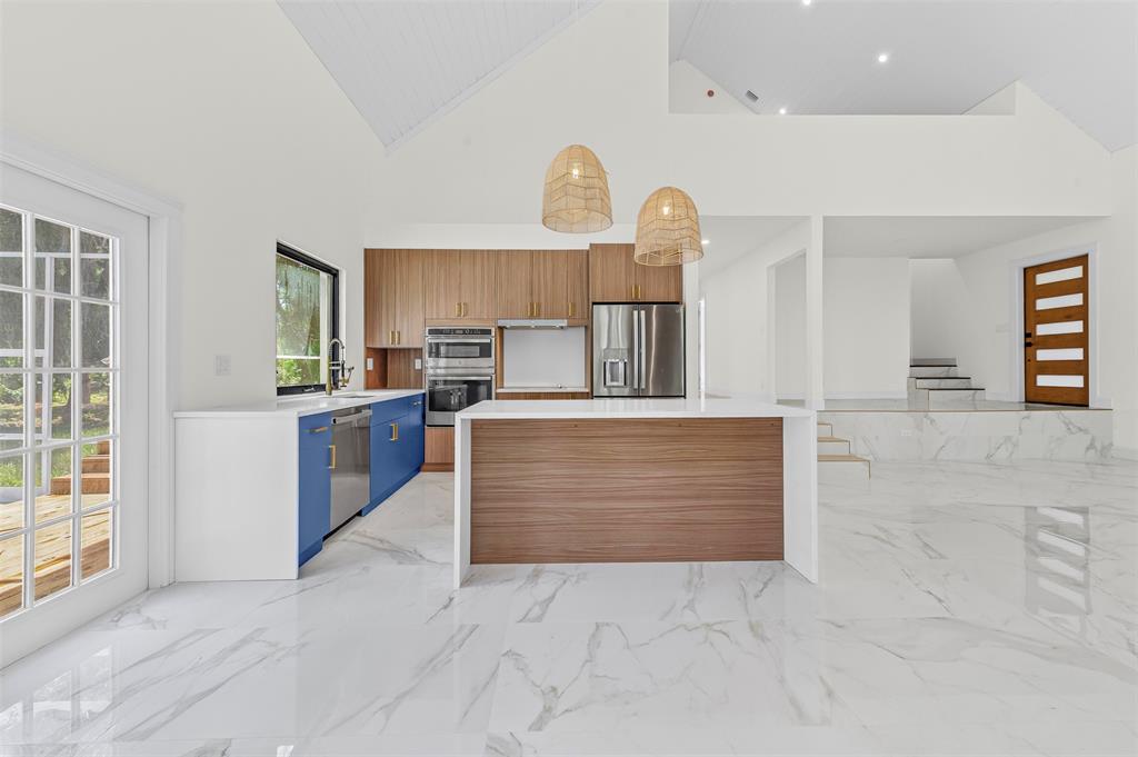 15184 Alexander Run Jupiter, FL 33478 - Photo 20 of 46 a view of kitchen with sink microwave and cabinets