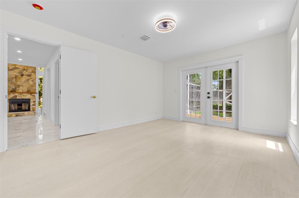 15184 Alexander Run Jupiter, FL 33478 - Photo 26 of 46 an empty room with windows