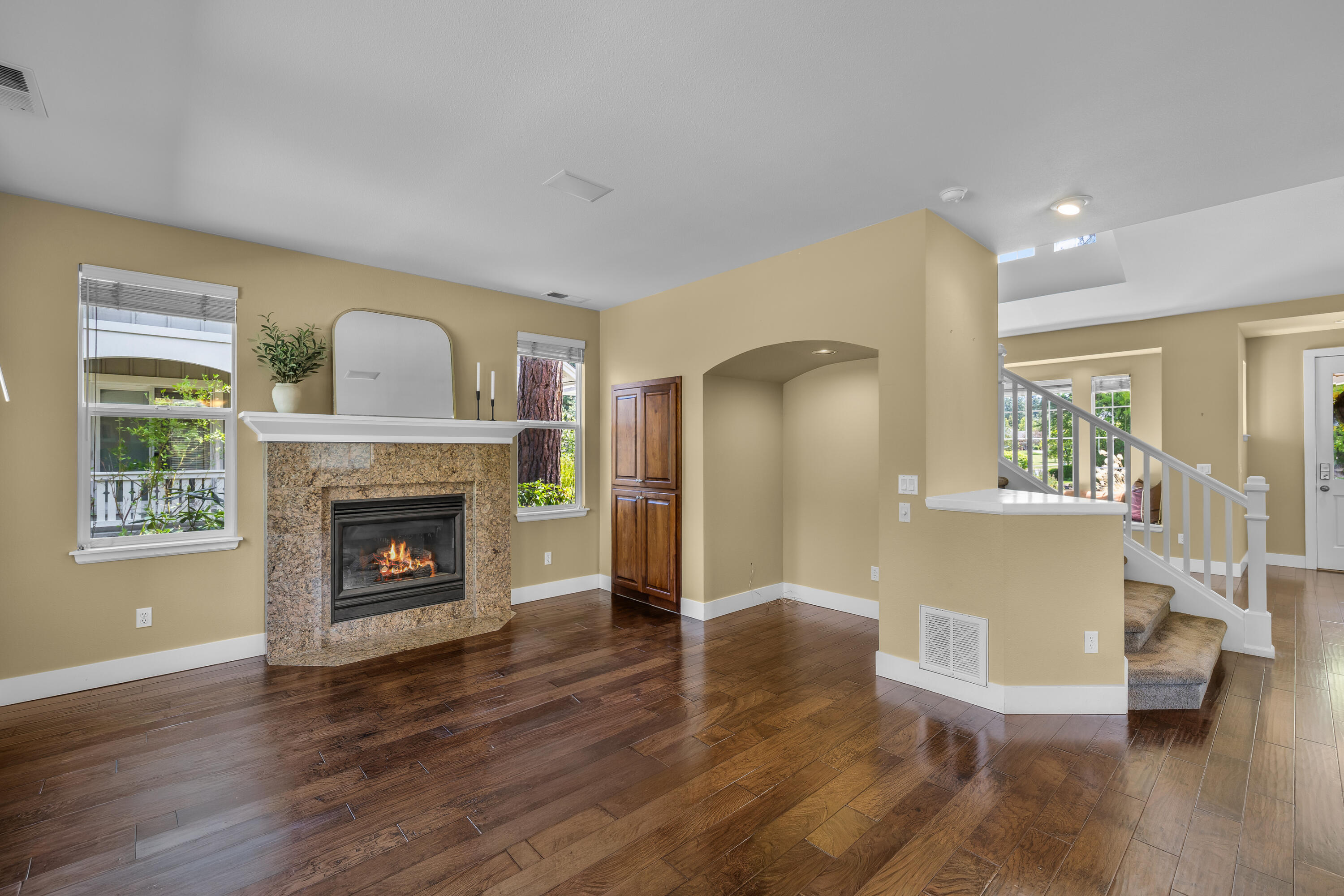 19307 Blue Lake Loop Bend, OR 97702 - Photo 16 of 58 a view of a livingroom with wooden floor and a fireplace