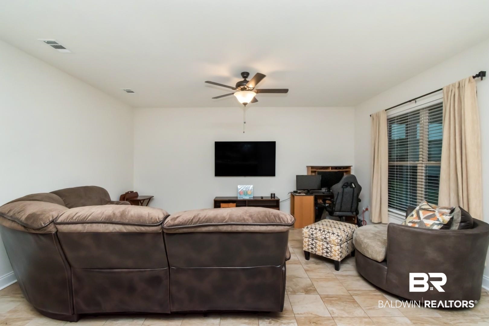 10714 Brodick Loop Spanish Fort, AL 36527 - Photo 14 of 26 Living area with ceiling fan