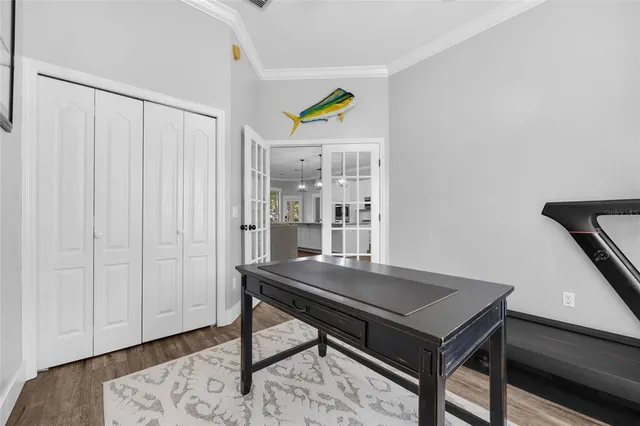 a view of a workspace with furniture