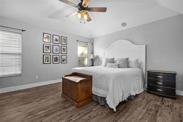 a bedroom with a bed and a dresser