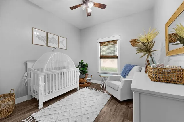 a bedroom with furniture and a window