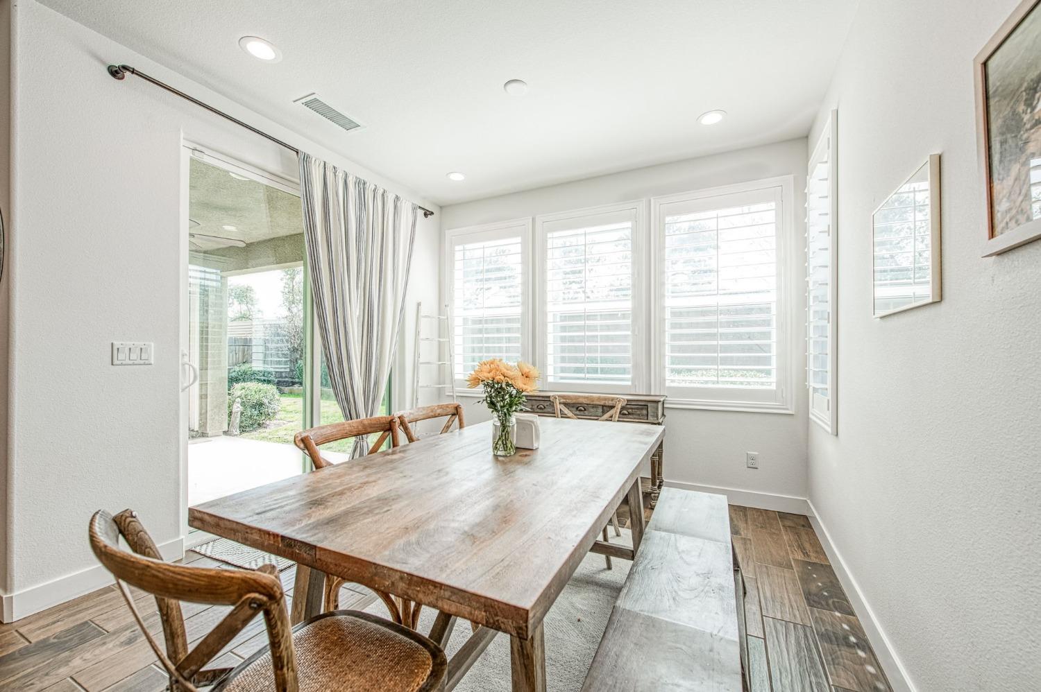 408 Grant Avenue West Madera, CA 93636 - Photo 15 of 42 a dining room with furniture and window