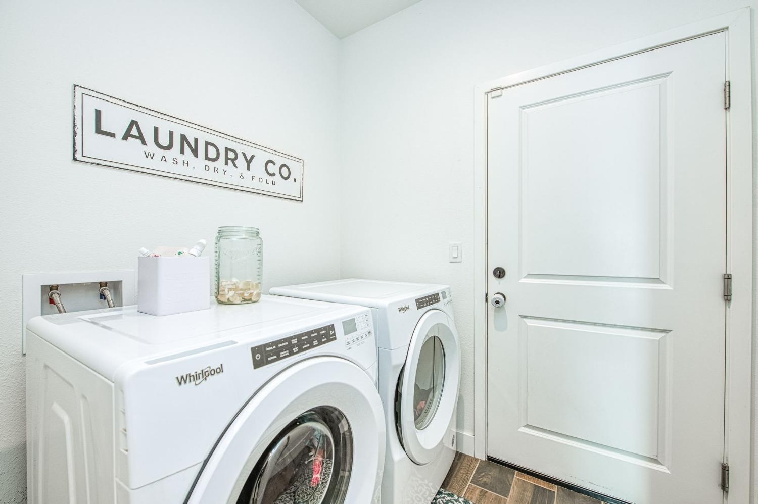 408 Grant Avenue West Madera, CA 93636 - Photo 17 of 42 a utility room with dryer and washer