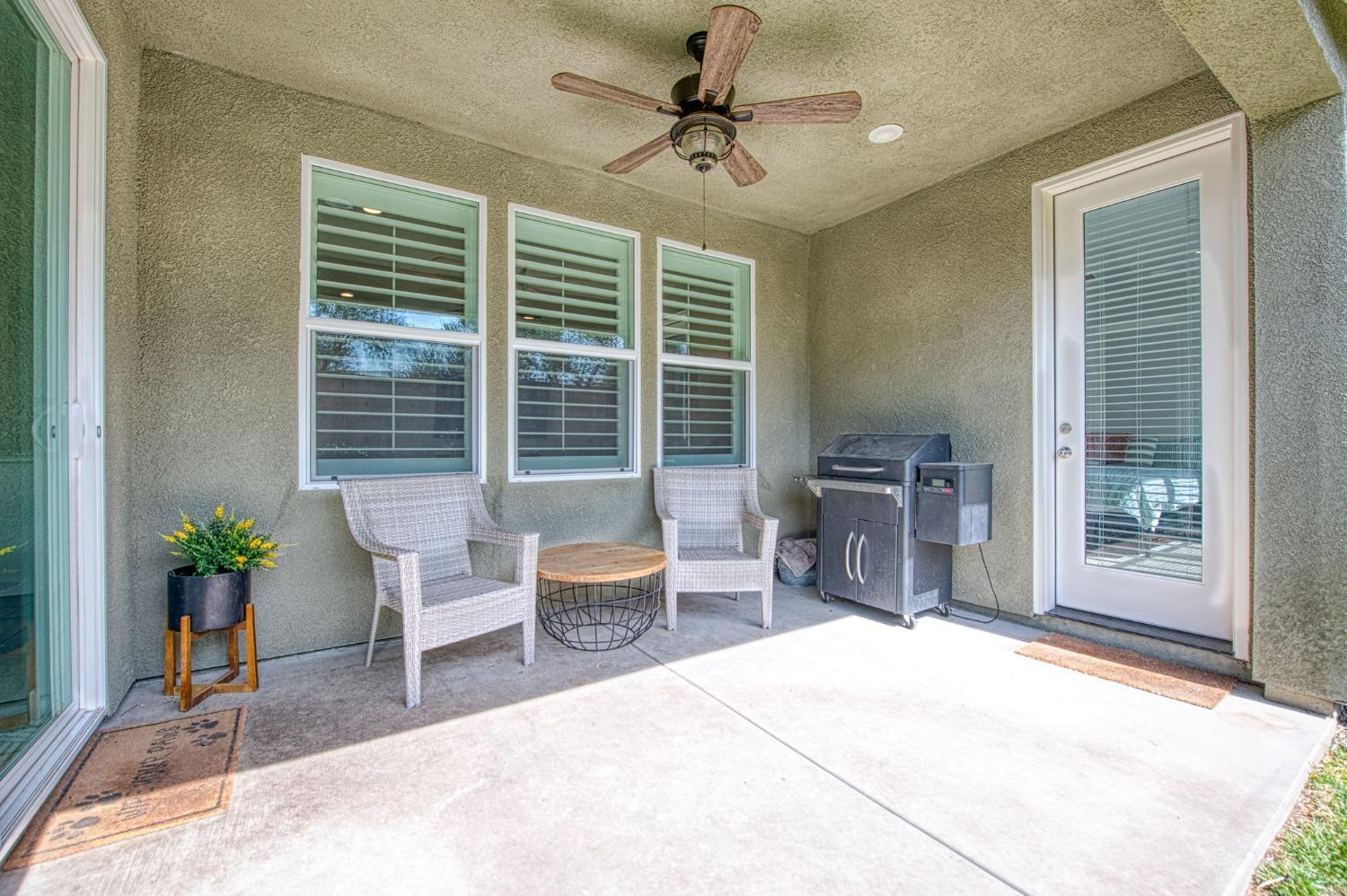 408 Grant Avenue West Madera, CA 93636 - Photo 28 of 42 a bedroom with furniture and a large window