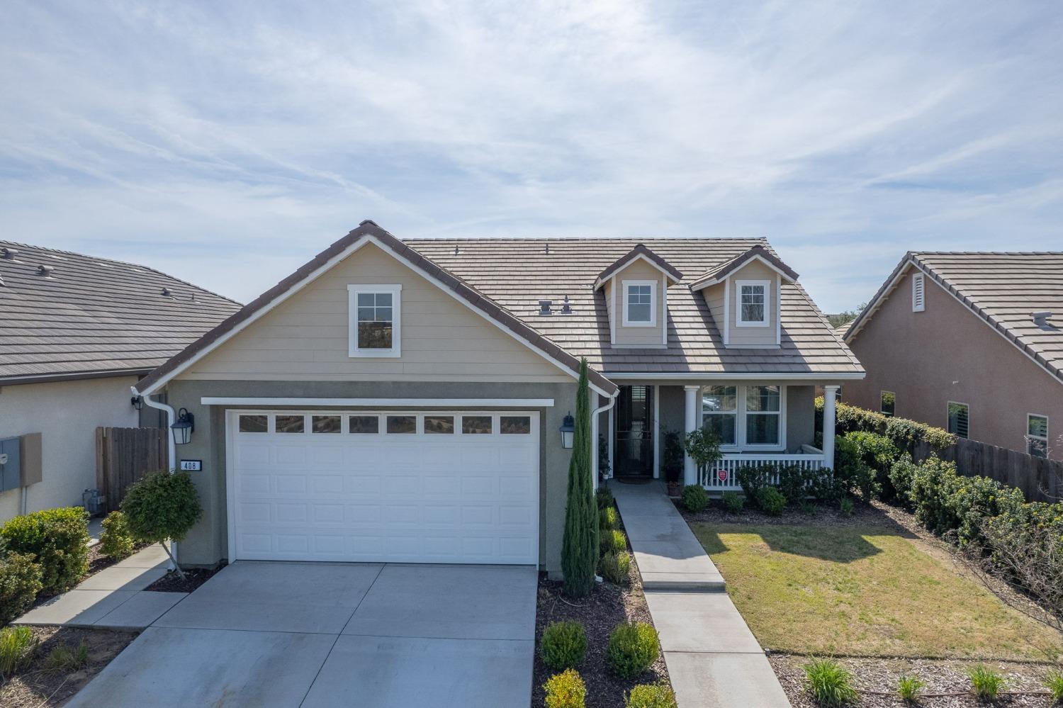 408 Grant Avenue West Madera, CA 93636 - Photo 35 of 42 a view of house with yard and street view